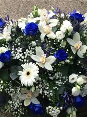 Blue and white double ended casket spray 