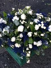 Navy and white double ended casket spray 