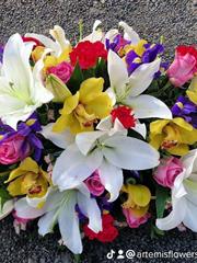 Bright and beautiful double ended casket spray 