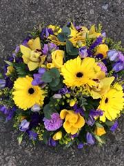 Yellow and purple posy arrangement 