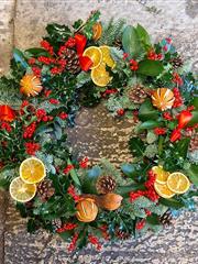Luxury graveside Christmas holly wreath 