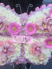 Butterfly tribute in pale pink 